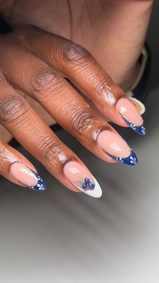 Blue French tips with hand-painted flowers
