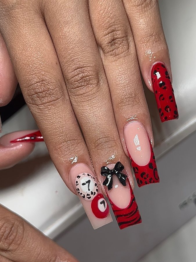 Red set with a question mark and bow detail