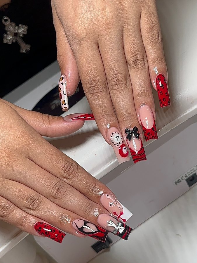Red and white playing card set with hand-painted bows